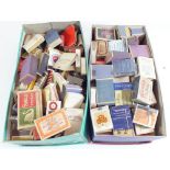 Two boxes of collectable match boxes and match books