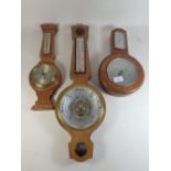 A Smiths barometer/thermometer, an oak cased Shortland barometer and one other barometer