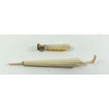 A 19th century ivory umbrella form novelty needle case and a small mother of pearl handled stone set