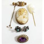 A group of three antique brooches, earrings and a stick pin