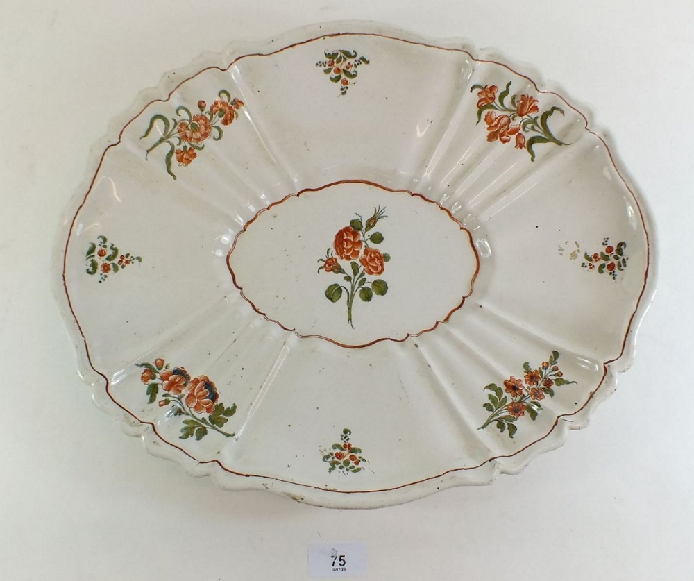 A continental floral Faience platter painted sprays of flowers, 40 x 31cm