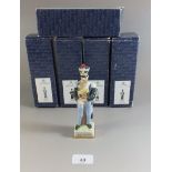 A set of six porcelain soldiers boxed, 16.5cm tall