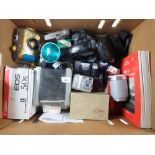 A box of cameras to include Canon E0S 50E and Polaroid hand camera