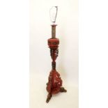 A Chinese red and gilt carved and painted torchere stand or floor lamp, now converted to