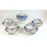 A set of four 19th Century porcelain cabinet cups and saucers decorated with floral sprigs