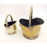 A brass coal scuttle and a smaller one