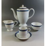 A Royal Worcester coffee set for twelve in the Medici pattern (missing one coffee cup) including