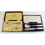 A silver christening spoon and fork cased and silver plated mother of pearl set boxed