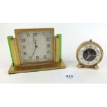 A 1930's Art Deco Oris small mantel clock with green glass and gilt metal case 9cm tall and an