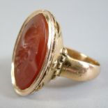 A Georgian 14 ct gold large oval gentleman's seal ring set cornelian carved with cameo bust of