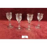 A set of four Edwardian Thomas Webb engraved liqueur glasses 12cm