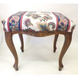 A French style stool with carved cabriole supports