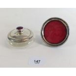 A cut glass and silver powder bowl with enamel finial and mirror to lid plus a small circular silver