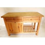 A hand made pine kitchen butchers block or free standing cabinet fitted drawers, cupboards and
