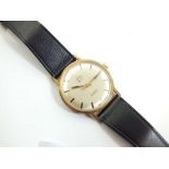 A Leda Genieve gents 9ct gold manual wrist watch