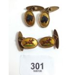 Two pairs of vintage cufflinks decorated with race horses and dogs