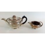 An early 19th century Sheffield plated teapot and jug by D & G Holy & Co