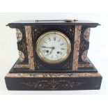 A Victorian architectural style slate mantel clock