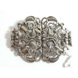 A silver large Art Nouveau brooch - originally a Nurses' buckle