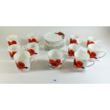 A Wedgwood Poppy set of 6 large and 5 small cups and saucers