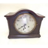 A 1920's mahogany cased arch top mantel clock with Westminster chime