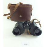 A pair of Barr and Stroud binoculars in a leather case