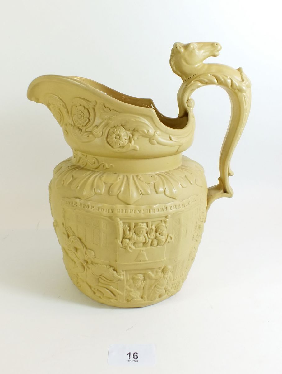 A Staffordshire stoneware relief moulded jug in a John Gilpin design - 26cm tall