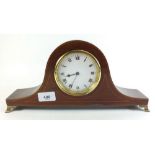 An Edwardian mahogany arch top mantel clock with French eight day movement