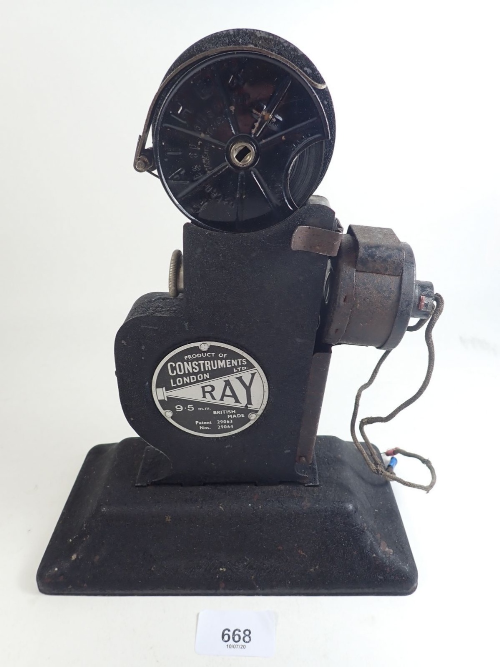 A Ray hand crank cine projector No 2, 9.5mm - including film cassette and winder- 4.5 volt, 1932