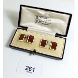 A pair of early 20th century 9 carat gold and enamel cufflinks, cased, total weight 7.6g