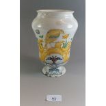 An 18th century Delft drug jar painted bird 'Vng Virid' 21cm, some chips