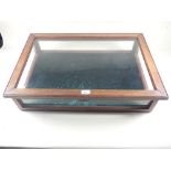 A tabletop jewellery or trinket display case with glazed top. 71cm by 49cm.