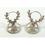 A pair of silver stag horn menu holders, Birmingham 1907 by HV Pithey & co