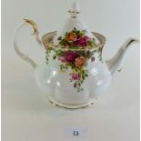 A Royal Albert Country Roses tea and dinner service comprising: six cups and nine saucers, eight tea