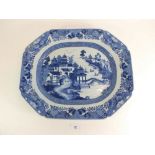 A large 18th century Chinese blue and white meat plate painted figures in a landscape with bridge 44