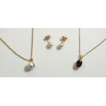 A 9ct gold pearl pendant and chain , a pair of matching earrings, and a 9ct gold garnet pendant