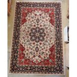 A cream ground full wool pile Turkish rug with floral medallion 145 x 100cm
