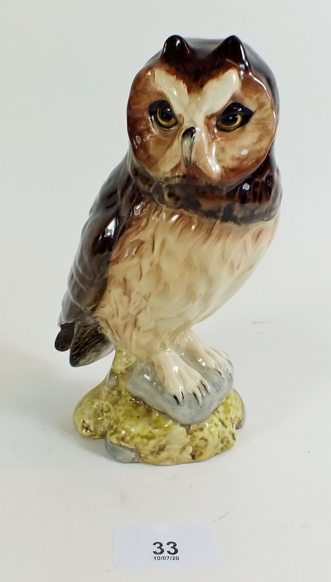 A Royal Doulton Whyte and Mackay short eared owl figural whisky bottle.