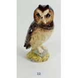 A Royal Doulton Whyte and Mackay short eared owl figural whisky bottle.