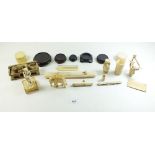 A collection of antique oriental ivory and bone, various wooden stands etc some a/f
