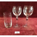 A suite of glassware with etched decoration comprising six tumblers, nine large wine glasses and
