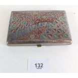 An Indian silver plated cigarette case with engraved and coloured decoration