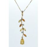 A 9ct gold leaf from multi stone pendent and chain