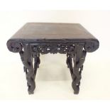 A Chinese hardwood carved occasional table