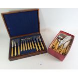 A quantity of bone handled fish cutlery including one set cased