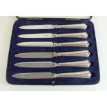 A cased set of six silver handled knives - Sheffield 1925.