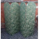 A green fabric upholstered four fold screen