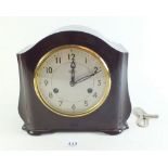 A Smiths Bakelite cased 1930's mantel clock, with key and striking movment, recently serviced