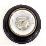 A late Victorian circular cased aneroid barometer