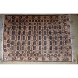 A Turkoman style rug with all over geometrical design 130 x 90cm